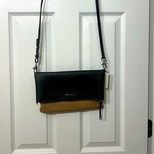 Leather flap cross body bag . Black and brown